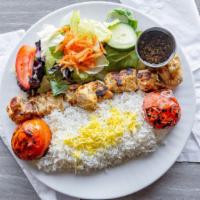 Charbroiled Chicken Kebab · Marinated in olive oil, lemon juice, and saffron. Served with basmati rice.