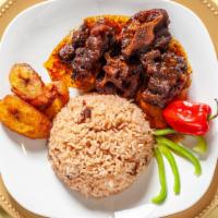 Brown Stew Chicken (Sm) · served with rice and one (1) side.