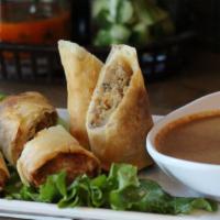 Spring Roll · Three pieces. Spring roll filled with vegetables, dried shrimp, and tofu with peanut sauce.