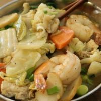 Flat Rice Noodle Poured With Thick Sauce · Shrimp, chicken, fish ball, fish cake, egg and vegetables.