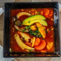 Sopa De Mariscos · Veggies, tilapia, shrimp, mussels, calamari and adobo sauce.