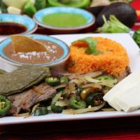 Carne Asada Platter · Grilled flank steak with onion, jalapeno, and poblano peppers, cactus and queso fresco. Serv...