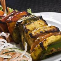 Paneer Tikka (Veg) · Cottage cheese/marinated in spices/grilled