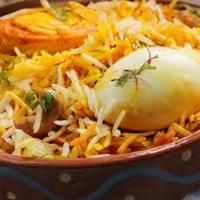 Egg Biryani · Eggs/Basmati Rice/Herbs and Spices/Slow cooking process