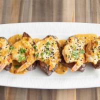 Spicy Eggplant & Shrimp · Batter fried eggplant with shrimp in a creamy, spicy, mustard sauce