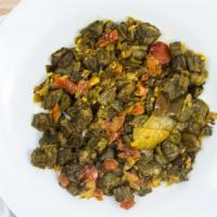 Bhindi Masala · Okra sautéed with onions, tomatoes, and oriental spices.