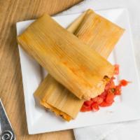 Tamales · Handmade tamales, made fresh daily, corn meal, filled with meat or vegetables wrapped and st...
