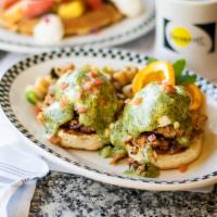 Pesto Eggs Benedicts · Pulled Chicken, Caramelized Red Onions, and Tomatoes. Served with two poached eggs on a gril...