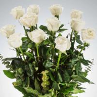 The Perfect Dozen White · A dozen white roses arrange in the glass vases with white gypso, eucalyptus, lather leaf, an...