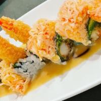 Angry Dragon · Shrimp tempura, avocado topped with spicy kani, orange edamame sauce.