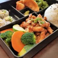 Teriyaki Bento · Chef choice sushi roll, appetizer, rice and soup or salad. Comes with choice of protein.