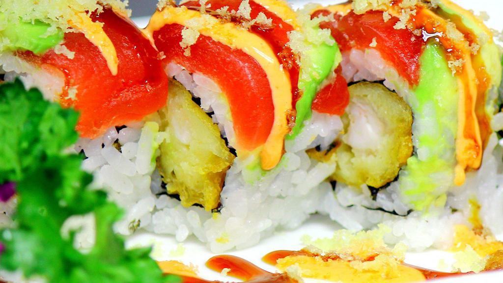 Christmas Roll · Shrimp tempura inside, topped with tuna, avocado, eel sauce, spicy mayo and tempura flakes.