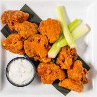Cauliflower Wings · Over one lb breaded and fried cauliflower tossed in your choice of sauce with blue cheese an...