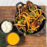 Fried Brussels · Gluten free. Crispy fried brussels sprouts with pickled jÃ­cama and carrots. Served with a h...