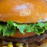 Doogy Burger · Brioche bun, beef patty, cheddar cheese, bacon, lettuce, 
tomatoes, corn, potato sticks, car...