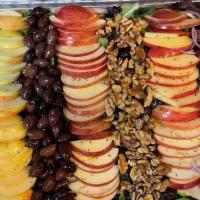 Apple Harvest Salad Tray · Assorted mixed greens, sliced apples, onions, olives, walnuts, bleu cheese crumbles, and gri...