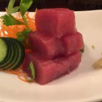 Sashimi Appetizer · Two pcs. tuna, two pcs. yellowtail, two pcs. salmon.