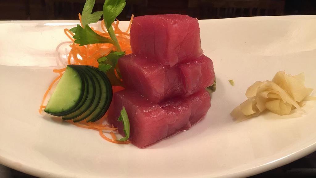 Sashimi Appetizer · Two pcs. tuna, two pcs. yellowtail, two pcs. salmon.