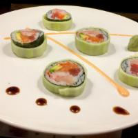 Kyoto Roll · King crab, tuna, salmon, yellowtail, masago, avocado, cucumber.