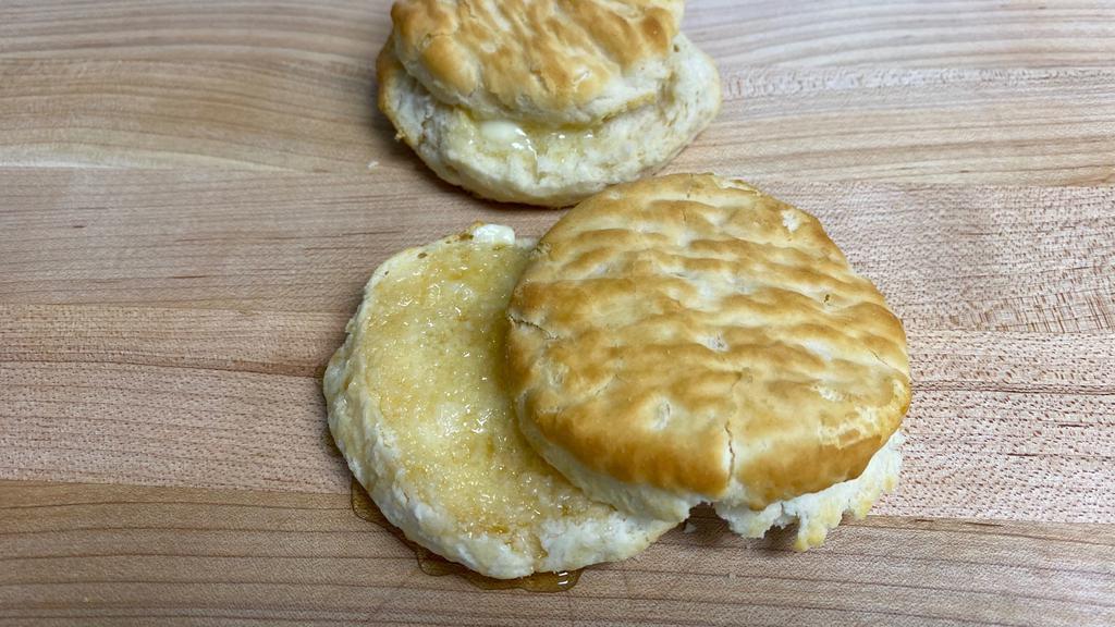 Warm Buttermilk Biscuit · with butter and honey