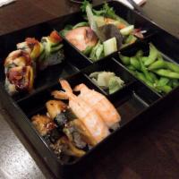 Fenway Bento · 4 piece Fenway roll, salmon sushi, tuna sushi, hamachi sushi, white escolar sushi, edamame a...