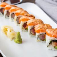 The Great Gatsby Roll · Spicy tuna, yellowtail and avocado inside, topped with torched salmon and eel sauce.