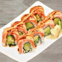 Torch Roll · Avocado and cucumber inside, topped with seared salmon, spicy mayo and eel sauce.