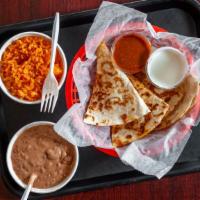 #7. Quesadillas · Flour tortilla quesadilla stuffed with cheddar cheese & your favorite meat choice.