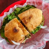 Torta Cubana · Mexican style hot served sandwich. The Cubana is made with Lettuce, Tomato, onions, avocado,...