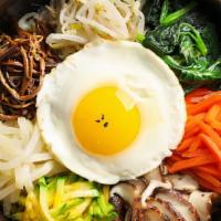 Bi Bim Bap · Rice with seasonal vegetables, sliced beef, whole egg. and served with dollop of gochujang (...