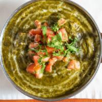 Saag Paneer · Paneer cubes cooked in a creamy spinach sauce.