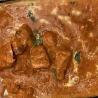 Butter Chicken · Chicken cubes cooked in creamy, buttery tomato sauce.