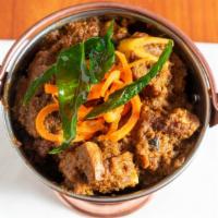 Chettinad Mutton Masala · Tender goat meat cubes cooked in a special sauce made of chef's hand ground aromatic Chettin...