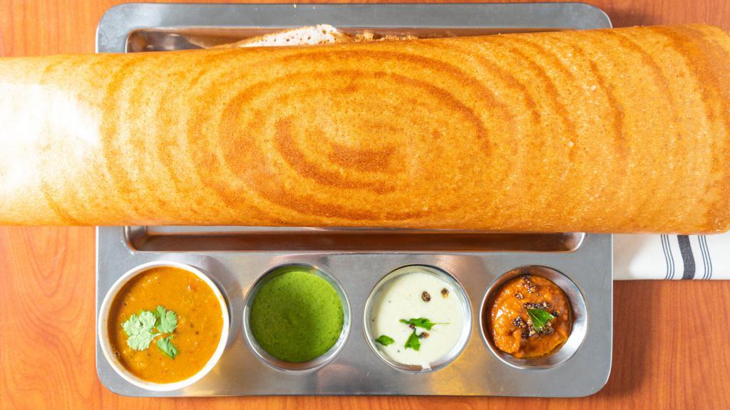Plain Dosa · Thin crepe made with lentil and rice flour.