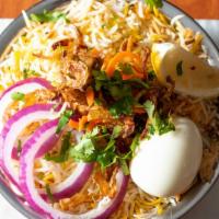 Chicken Dum Biryani · A world famous amazing indian dish. made from hand picked long grain basmati rice and our ch...