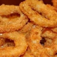 Fried Onion Strings · Fresh thinly sliced onions, dredged in flour and flash fried.