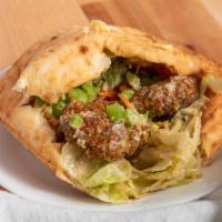Falafel · ground garbanzo beans with parsley, cilantro, onions, garlic and seasonings served in a pita...