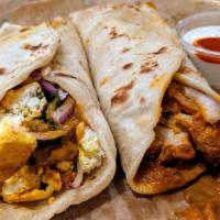 Paneer Wrap · naan filled with paneer tikka, lettuce, green peppers, and onions topped with cilantro chutn...