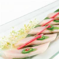 Yellowtail Jalapeno  · Hot. Fresh yellowtail with sliced jalapeno on top and drizzled with wasabi yuzu sauce.