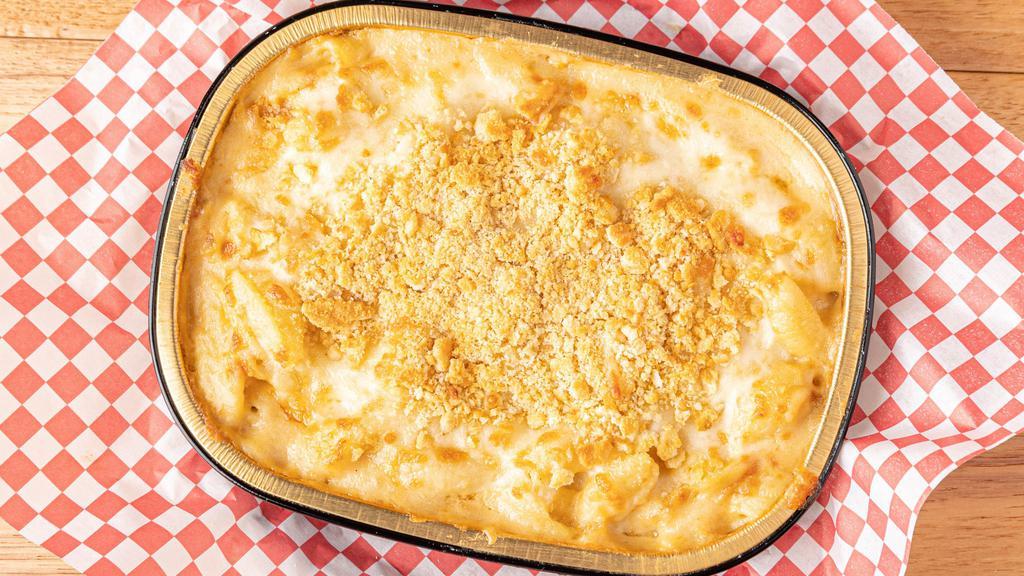 Classic Mac N Cheese · Mothers three cheese mac sauce made fresh daily tossed with medium shells baked with cheese and ritz cracker crumbs