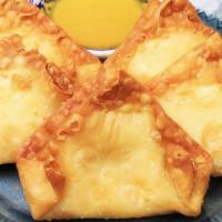 Crab Rangoon · Homemade wonton filled with cream cheese, crab meat, chopped onion served with pineapple sau...