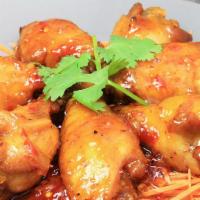 Chicken Wings · Fried marinated with your choice of :rn original: served with chili garlic sauce or spicy ti...
