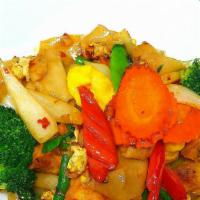 Drunken Noodle · Spicy. Stir fried flat noodles with egg, mixed vegetables in hot basil sauce.