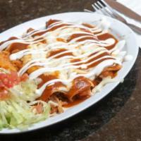 Enchiladas · Three corn tortillas stuffed with your choice of protein and topped with red, green or mole ...