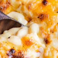 Southern Mac & Cheese · Creamy Cheesy Southern style baked Mac & Cheese made using classic elbow pasta.
