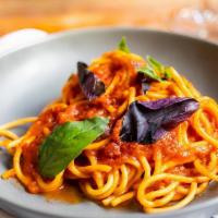 Spaghetti Pomodoro · Long thing pasta.