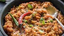Baingan Bhartha · Char grilled and roasted aubergine slow cooked whole with onions, tomatoes, green chillies a...