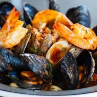 Pescatore · Shrimp, clams, mussels, and crab in a red or white sauce.