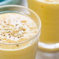 Mango Lassi · Creamy yogurt shake made with mango pulp served cold.