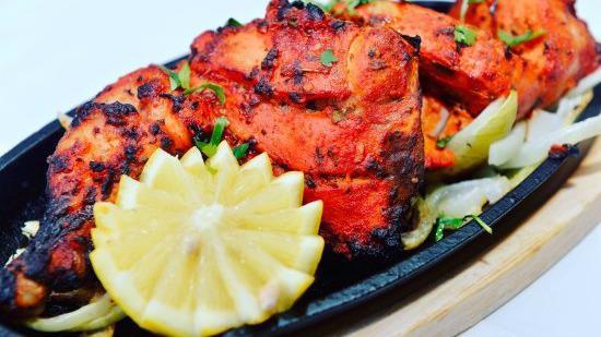 Tandoori Chicken Whole · Whole chicken marinated in fresh spices and cooked to perfection.
